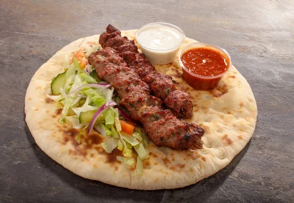 depositphotos_214300756 stock photo tasty indian naan wrap 580x400